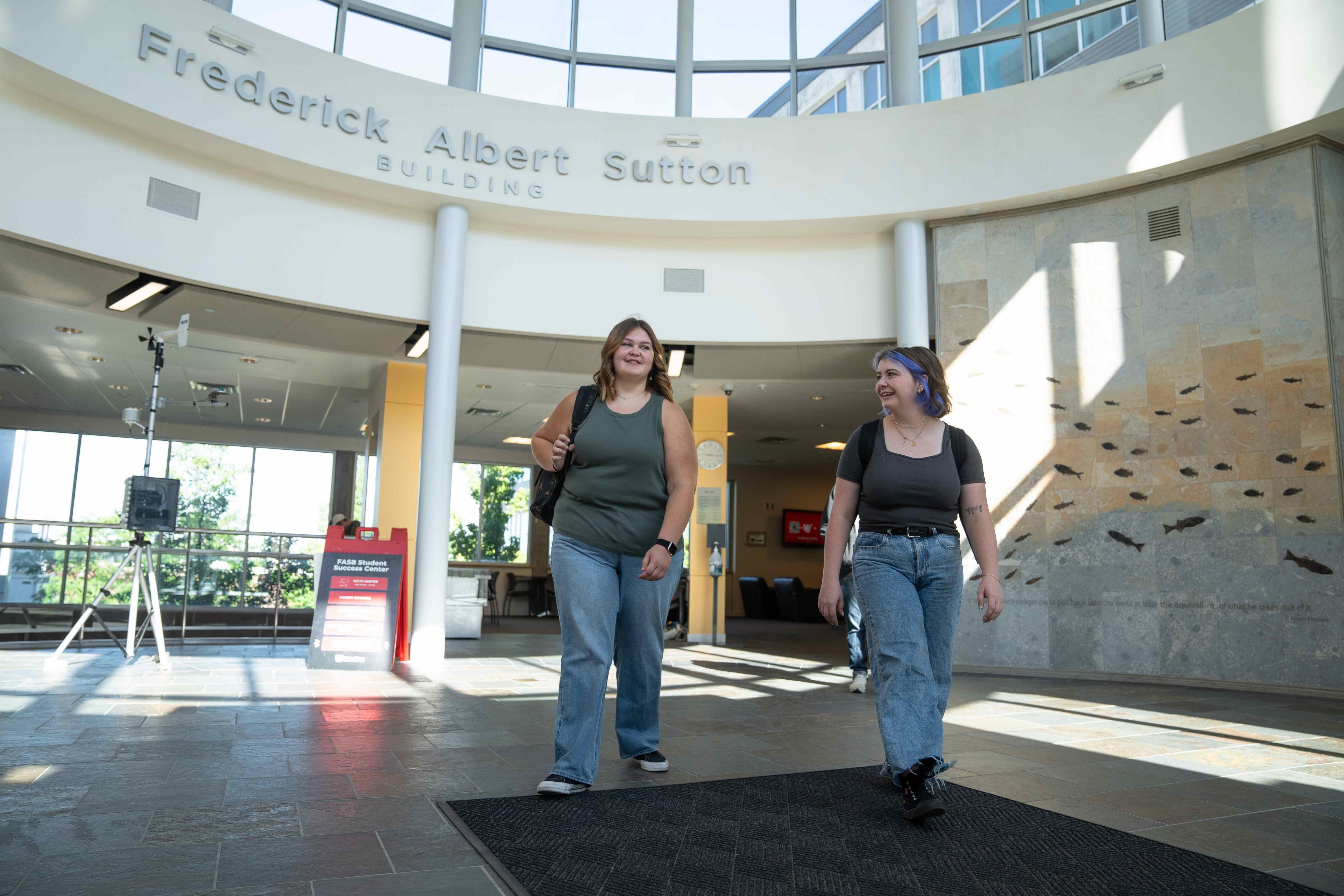 Students walking through confluence